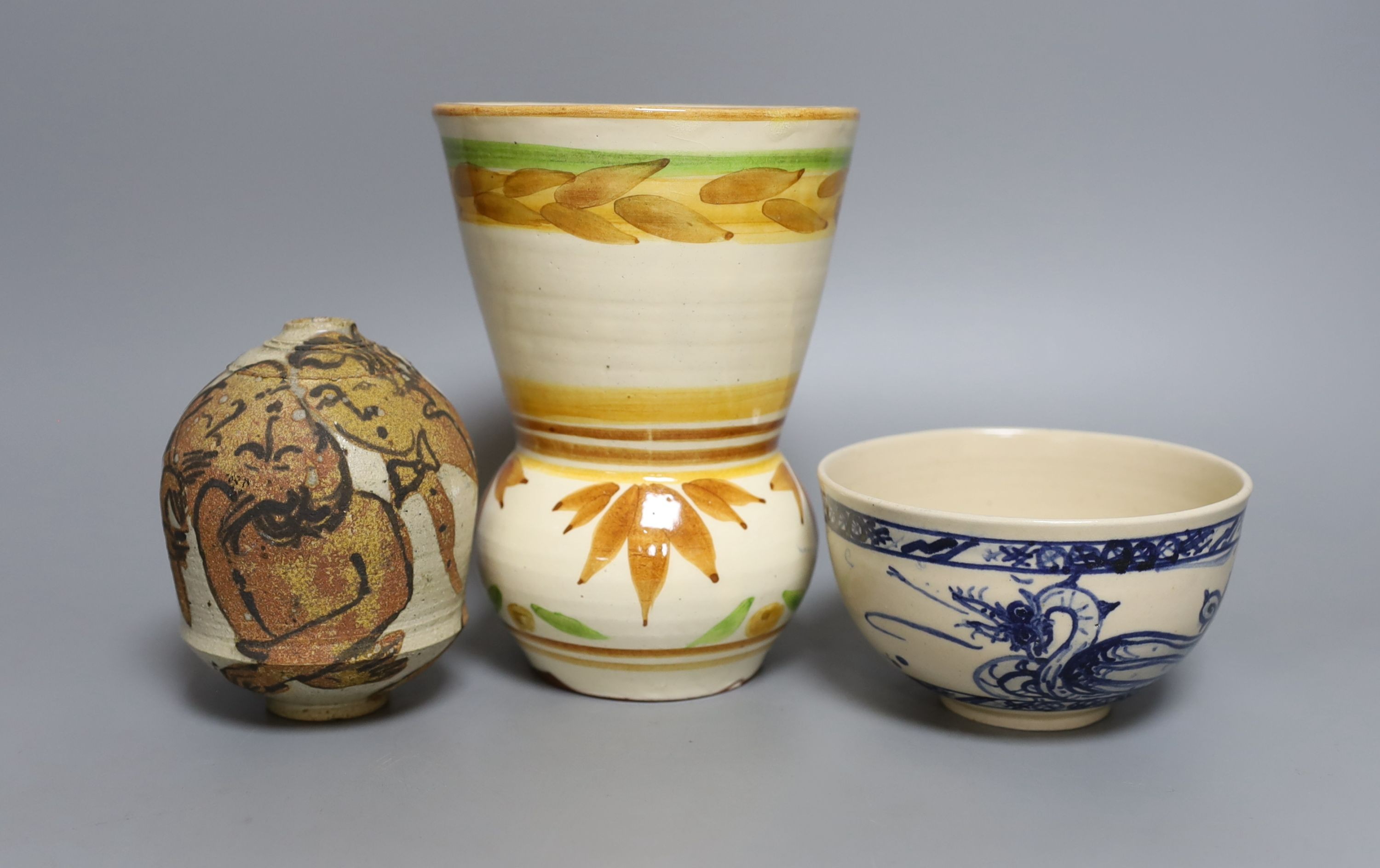 Three pieces of Yolande Beer pottery, to include a vase, ‘griffin’ bowl and a stoneware figural vase, tallest 17cm